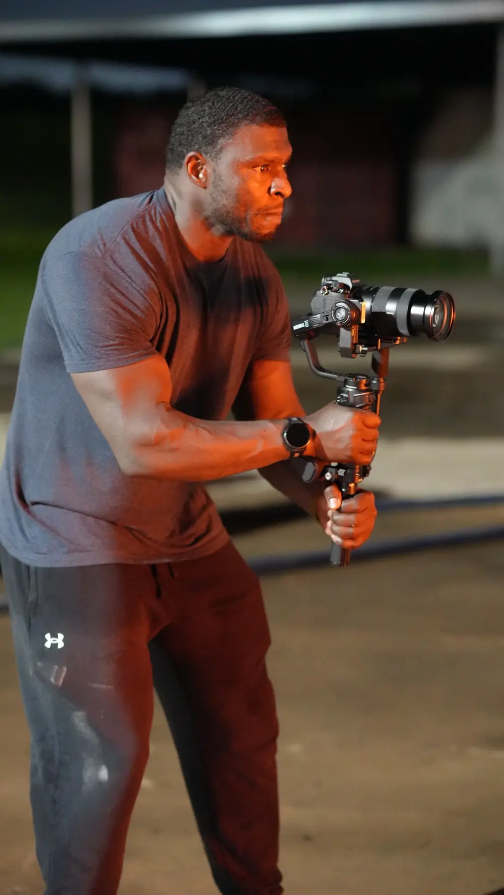 Thomas Cannon operating a camera gimbal during an on-location production