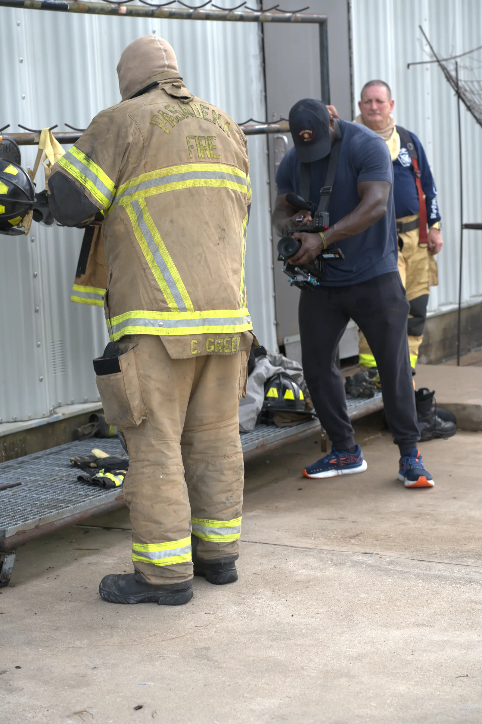 Thomas Cannon filming a firefighter during an on-location training production